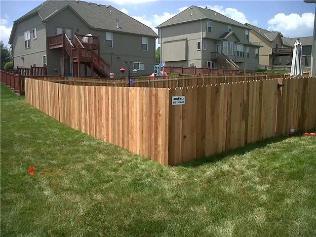 Four-foot cedar privacy fence around a backyard