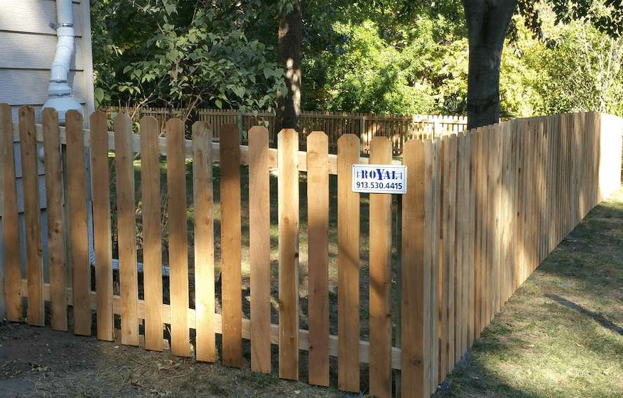 Four-foot spaced cedar picket fence with plain treated posts