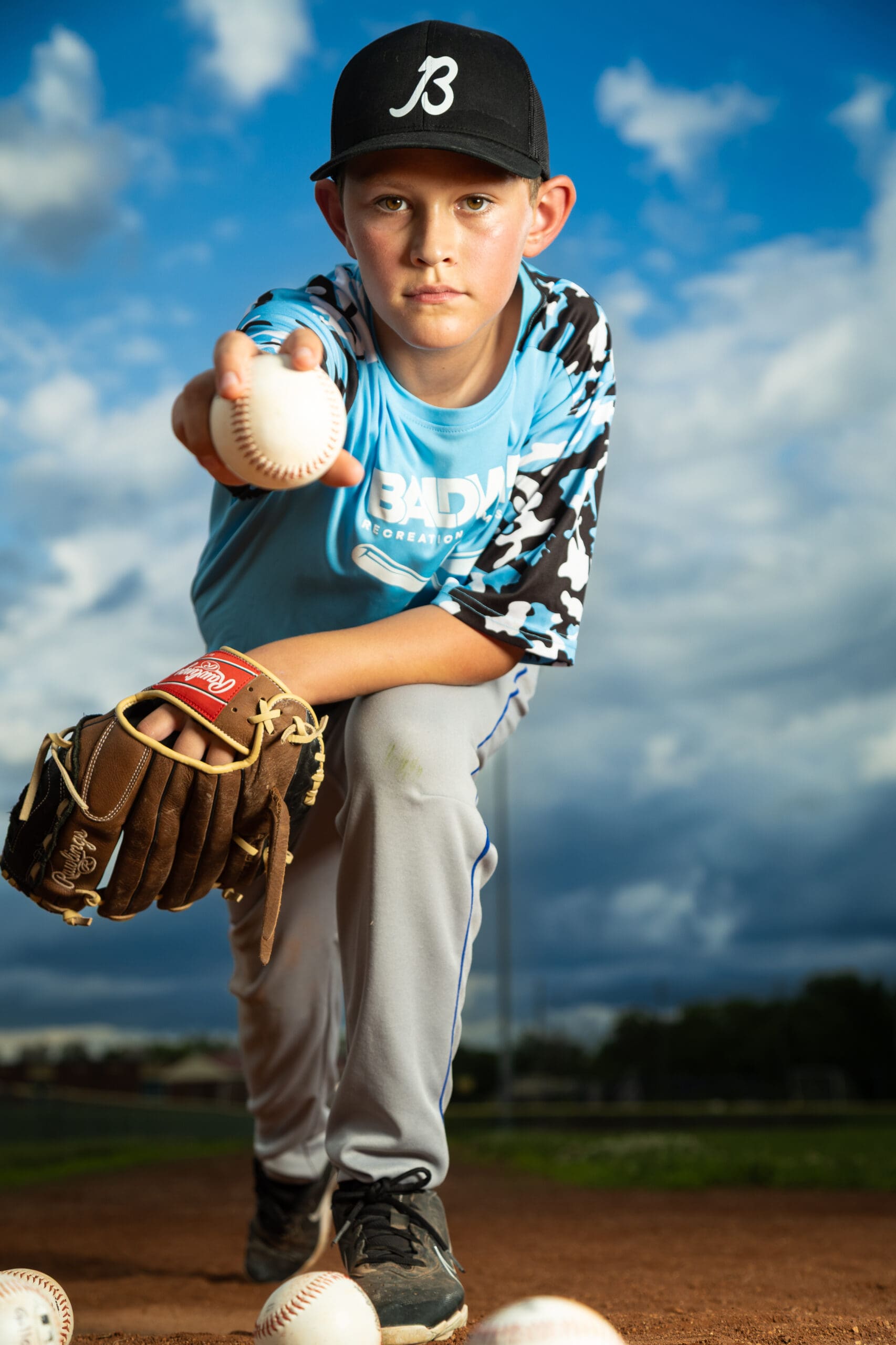 Kansas City Sports Photographer, custom team exclusive session with professional lighting setup and bold athlete poses